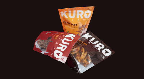 Kuro treat packages on a black background
